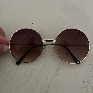 Circle gold rimmed sunglasses